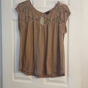 Sleeveless top with lace inset